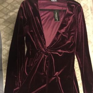 This is a new Fashion Nova velvet burgundy dress!